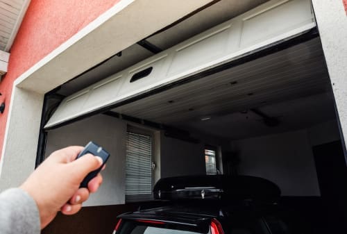 Is it safe to repair a garage door yourself